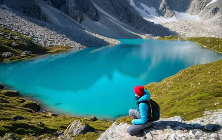 폭포와 호수 여행 코스 - An ethereal landscape of a tranquil mountain lake at sunset. The sky is ablaze with vibrant hues of ...